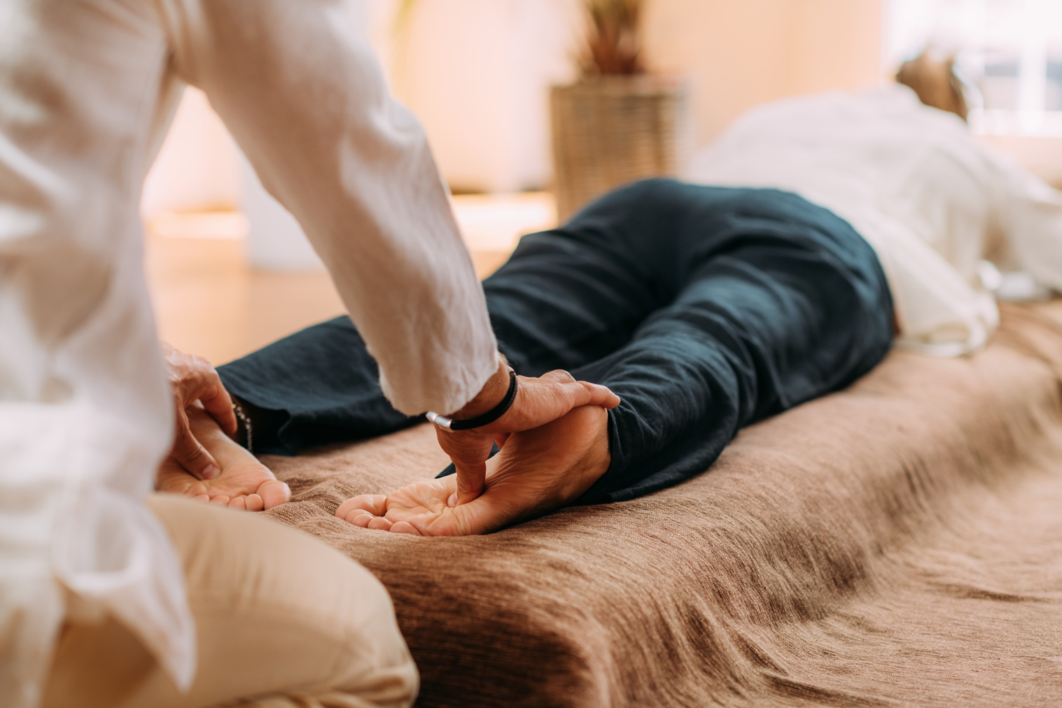 Shiatsu Foot Massage. Therapist Massaging the Kidney Meridian